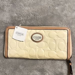 Authentic Coach brand white/tan zipper wallet